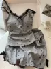 Shorts with bow, top with cups, lifting effect