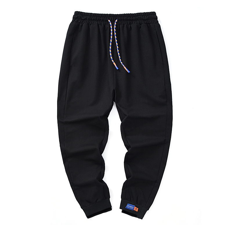 Pantalones de estilo de Hong Kong Pantalones deportivos de alta calidad para hombres pantalones de chándal de color sólido de punto pantalones casuales para hombres