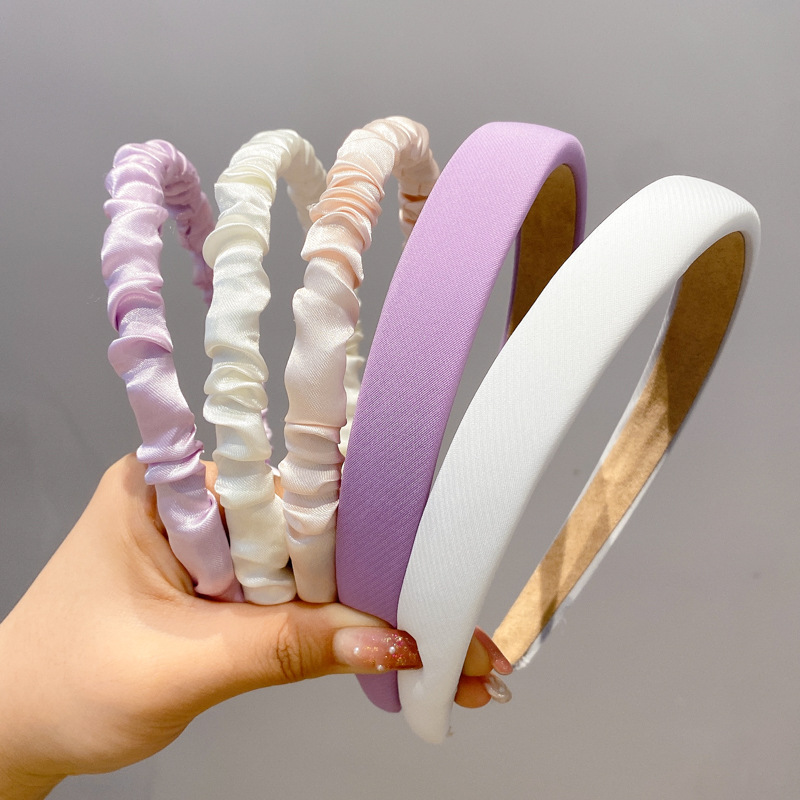 A principios de la primavera, la banda de cabello para mujeres en línea, 2025 nuevo lavado de cara de presión de tarjeta de cabello para el cabello, banda de cabello de perlas, banda de cabello para mujeres.