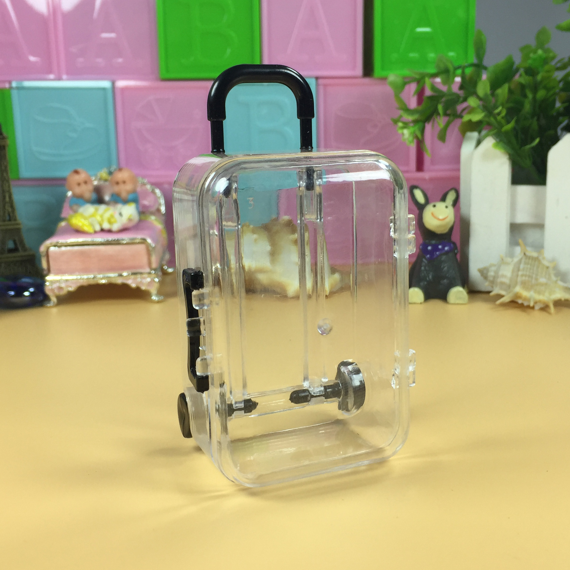 Small transparent suitcase