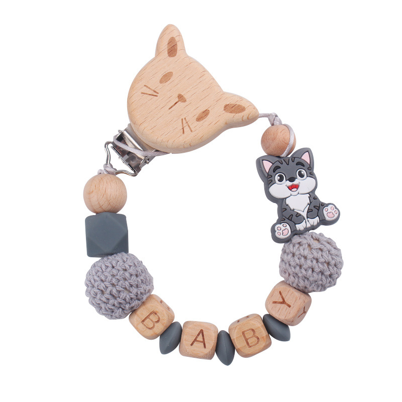 Nuevo bebé gato clip de chupeta de madera de haya dibujos animados juguetes de silicona para gatos calmar bebés chupeta cadena anti-caída cadena