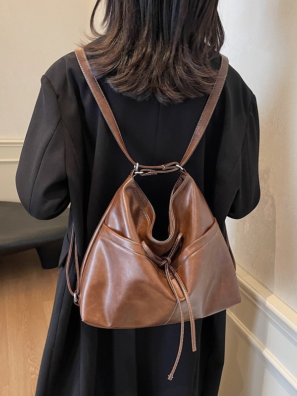 Bolsos de gran capacidad de otoño e invierno de comercio exterior para mujer 2024 nuevo bolso retro de alta gama con sentido Tote mochila de un solo hombro de todo fósforo