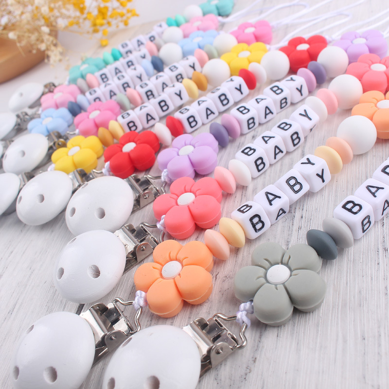 Nuevo bebé suministros dibujos animados colorido flor mordedor calmante bebé DIY hecho a mano con cuentas pezón anti-gota cadena