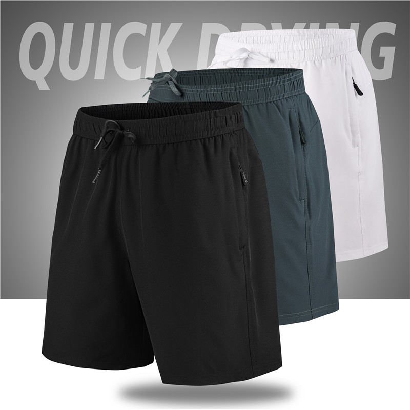 Pantalones cortos deportivos casuales para hombres, pantalones de playa de acondicionamiento rápido y secos, pantalones de hielo largos y sueltos.