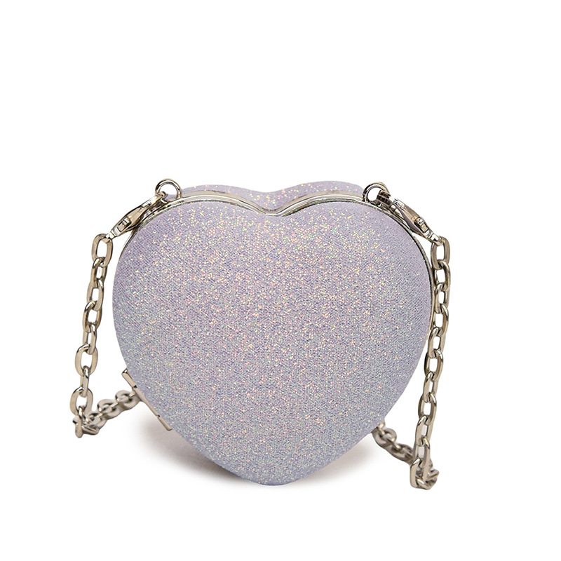 Pequeño viento japonés de fragancia personalidad de color caramelo de corazón de melocotón mini auriculares para mujeres bolsas de 24 verano nuevo hombro mochila