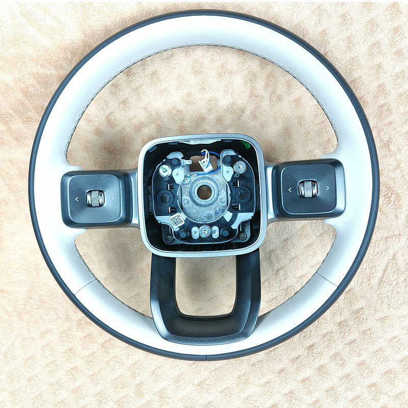 Compatible with Chery iCAR V23 steering wheel assembly 404AA1, featuring a two-tone genuine leather design and multi-functional buttons. Quality guaranteed