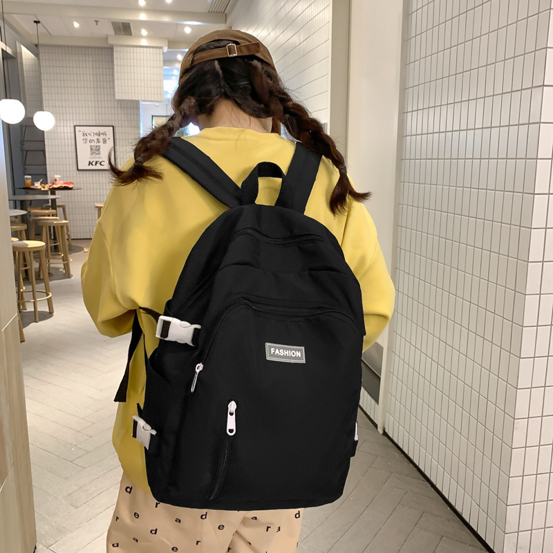 Nueva mochila de gran capacidad de 2025 moda coreana ocio simple mochila de escuela secundaria mochila de viaje de gran capacidad