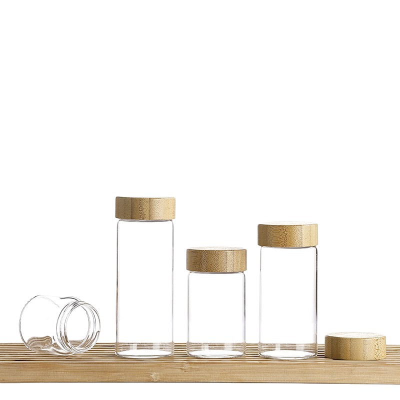 Botellas de tubos de borosilicato de alto contenido al por mayor, botellas de vidrio selladas con tapa de grano de madera de 47 mm de diámetro, botellas de embalaje de polvo de píldoras visuales image 6