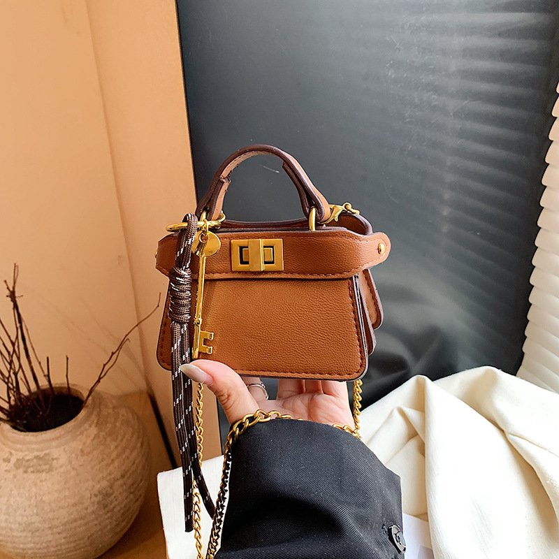Coreano simple bolso de niña de color sólido mini bolso de bebé 2026 bolso para niños de comercio exterior transfronterizo