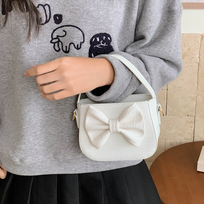 Dulce pequeño fresco bolso de hombro infantil lindo arco de color sólido bolso para padres e hijos nuevo bolso de accesorios para niñas