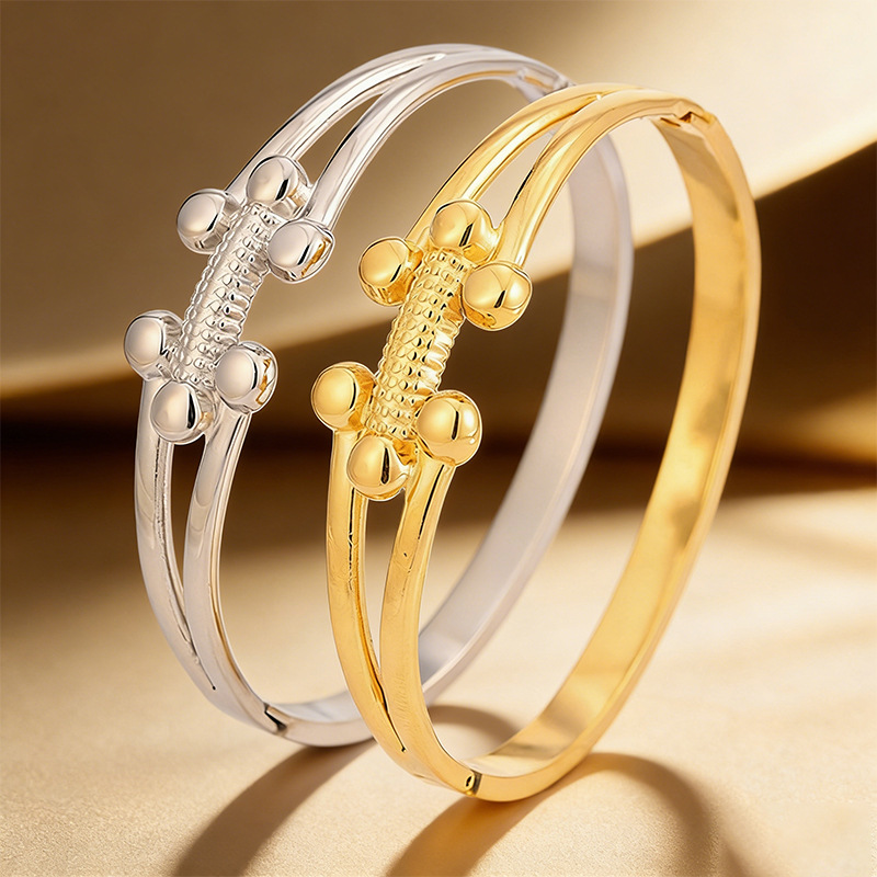 Brazalete de acero inoxidable de moda transfronteriza europea y americana lujo ligero de alto nivel sensación de bolas pequeñas h brazalete de apertura de oro mujer al por mayor