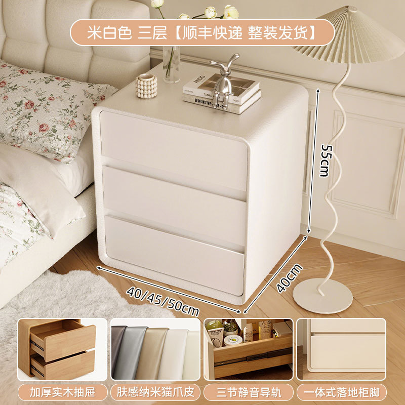 Mesita de noche de estilo crema de madera maciza 2025 estilo caliente dormitorio doméstico lado de la cama lujo ligero de alta calidad tres capas 55CM gabinete de almacenamiento