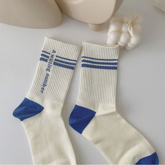 Korean-style Instagram-inspired mid-calf socks: trendy, must-have pairings for couples—classic college-style striped fashion socks.
