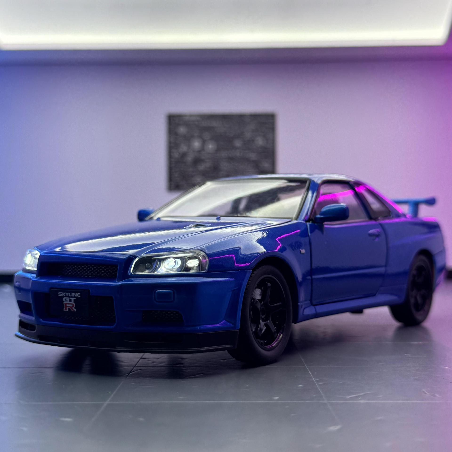 Modelo de coche de aleación Weili 1:24 Nissan GTR coche deportivo retorno luz y sonido coche de juguete modelo R34 decoración al por mayor