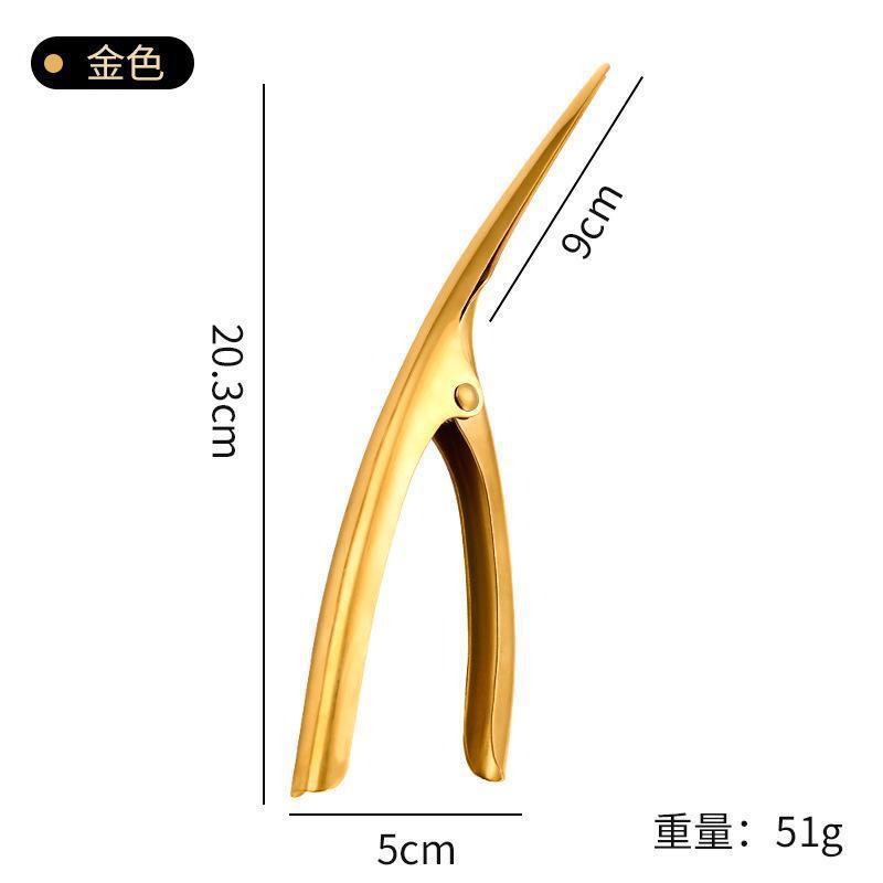 ステンレスのエビの線の刀はエビの線に行って家庭の台所のツールのエビの線を挟みます。|undefined
