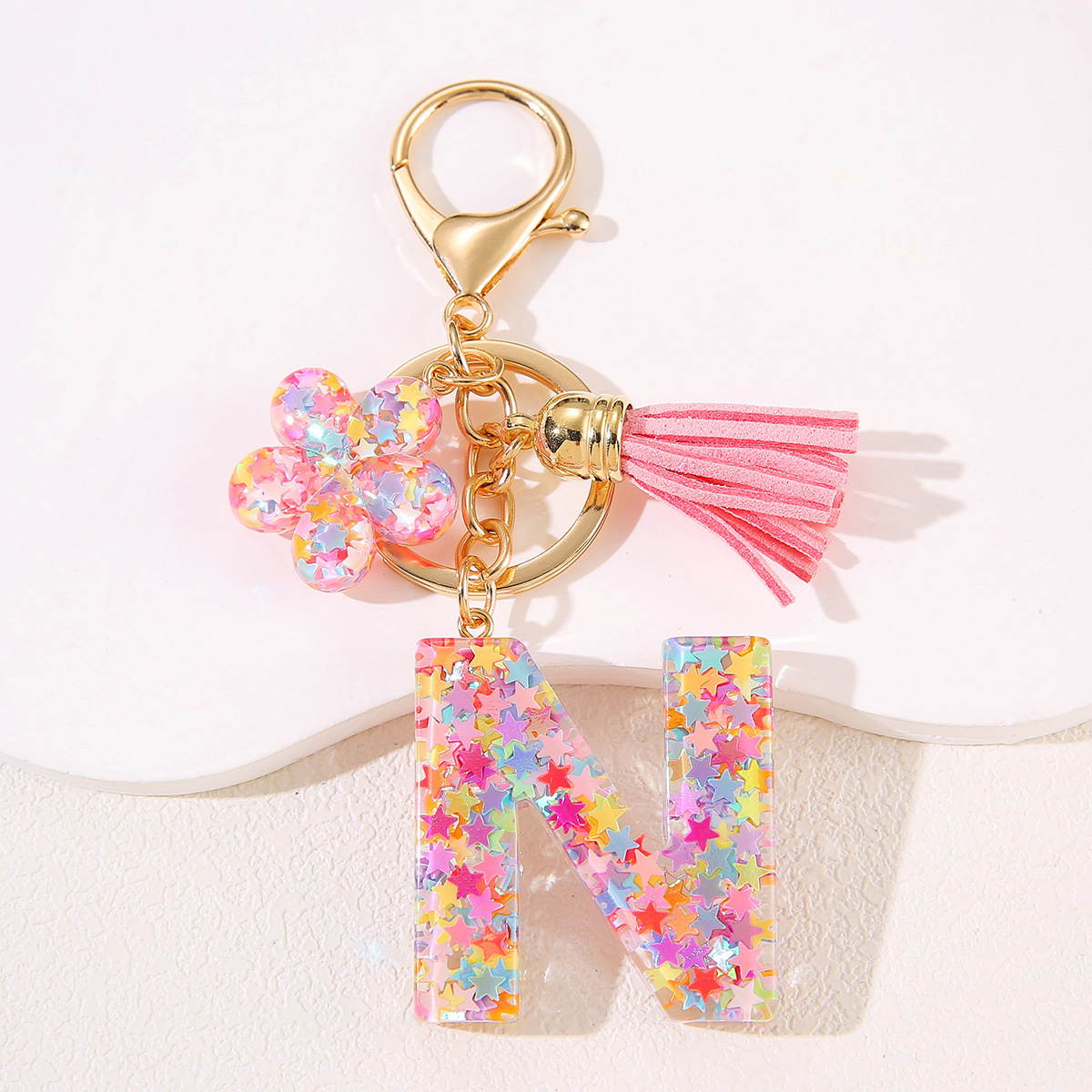 Un nuevo llavero flor de goteo de goma esquinilla 26 letras bolsos colgante llavero accesorios Yiwu