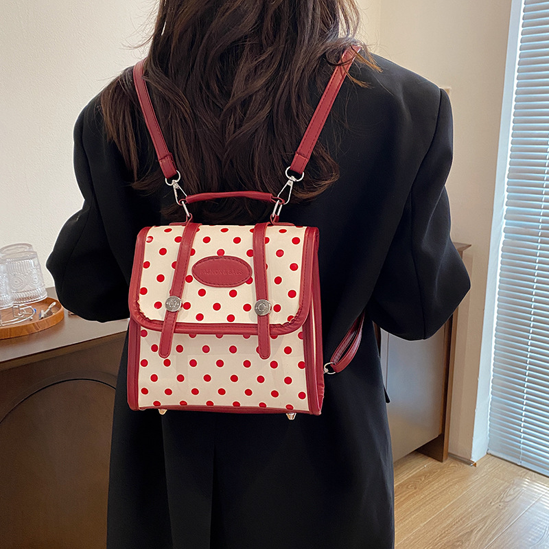 Mochila de estudiantes de ondas coreanas para mujeres 2024 nueva moda alta sensación de nicho de moda mochila de viaje