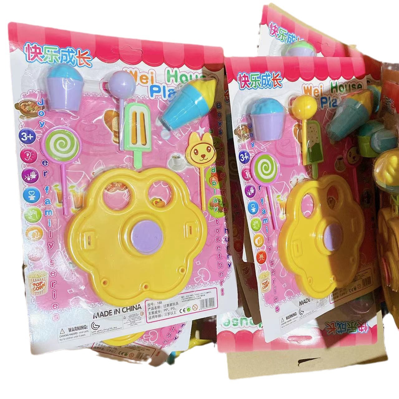 Juego de caramelo de juguete para niños juego de simulación de juguete de Casa coche comedor helado puesto de juguete anillo 2 yuanes al por mayor