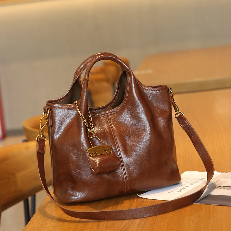Guangzhou Women's Bag 2024 New Genuine Leather Portable Small Bag Sense Tote Bag Simple Casual Shoulder Crossbody Bag