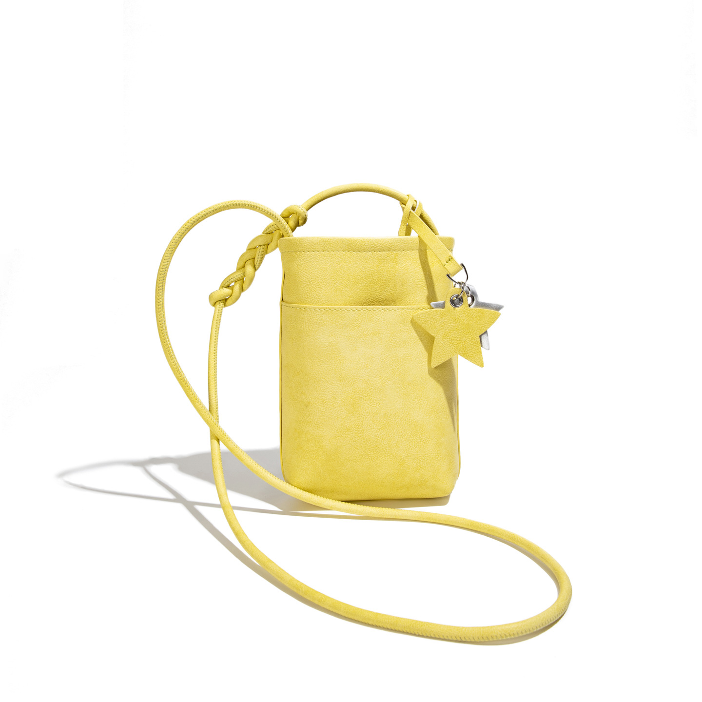 La versión coreana de nicho de color sólido bolso de teléfono móvil para mujeres 2026 verano nuevo pequeño y ligero bolso de hombro pequeño