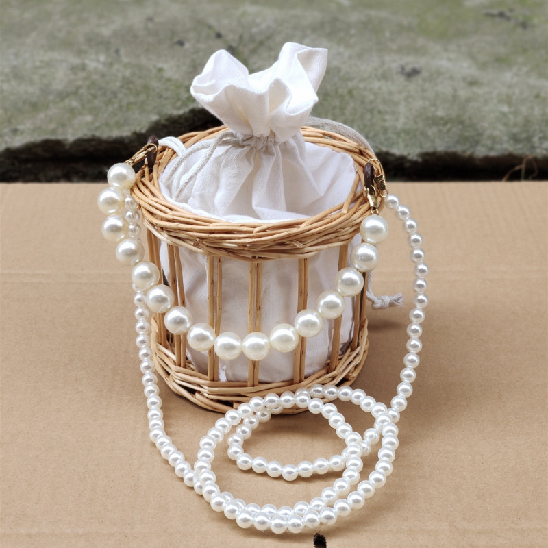 Bolso de paja de verano para mujer 2021 Nuevo bolso de celebridad de Internet bolso de perlas bolsa de ratán de regalo de mano bolsa de cubo de playa