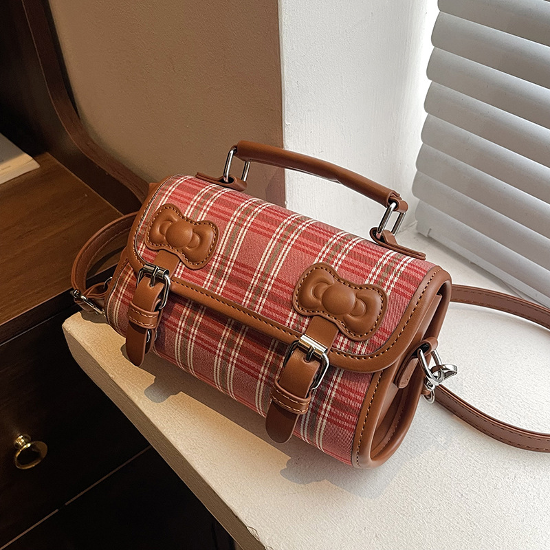 2025 otoño y invierno nuevo estilo británico bolso de mano casual versátil bolso de hombro a rayas bolso de viaje coreano