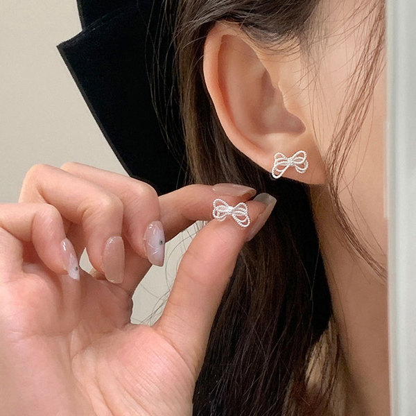 Retro elegant fashionable trend earrings with pigtail with bow