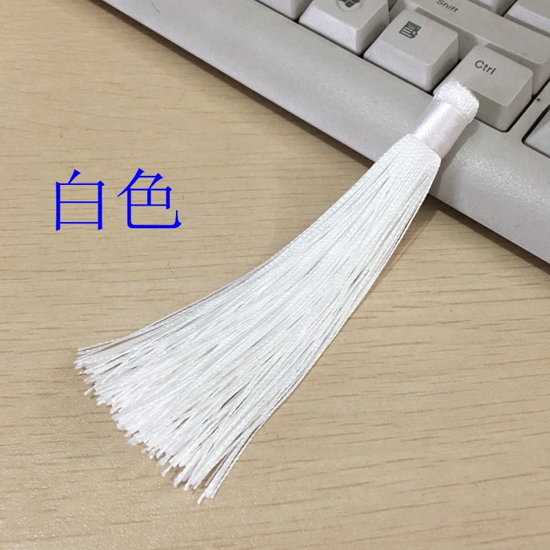 White small car hanging tassels