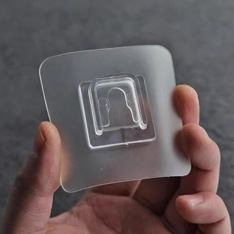 Traceless mother-in-law buckle, punch-free plug hook, strong attachment to router, fixed wall-mounted adhesive hook, storage hook wholesale