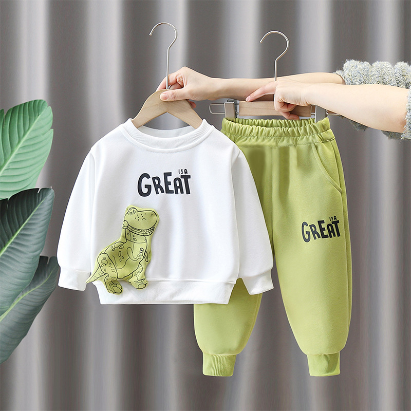 7095 traje de suéter para niño primavera para niños estilo occidental ropa de dinosaurio bebé casual de dos piezas 2025 nueva primavera