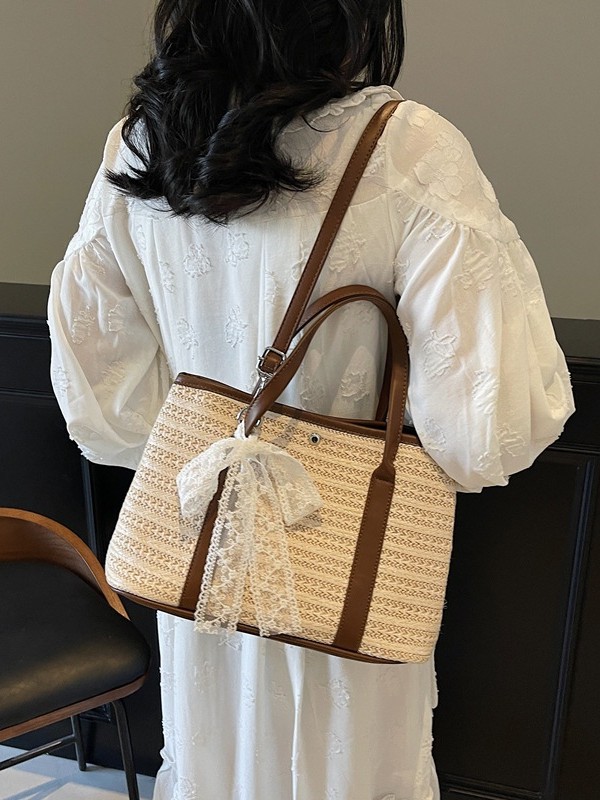 Paja tejida de color bolso de mano 2026 nuevo estilo transfronterizo vacaciones de estilo de alta calidad en la playa bolso de hombro