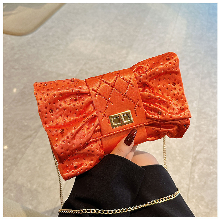 Paquete de cena de damas transfronterizas, paquete de fiesta de lujo ligero de diamante, paquete de cena de mano de arco de arco de oro de alto nivel