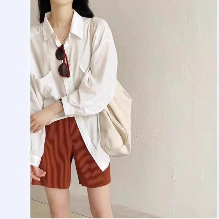 2025 nuevos pantalones cortos de pierna ancha plisados para mujer, pantalones de cinco puntos que cubren la carne de verano de estilo coreano, cintura elástica suelta y versátil, descanso recto