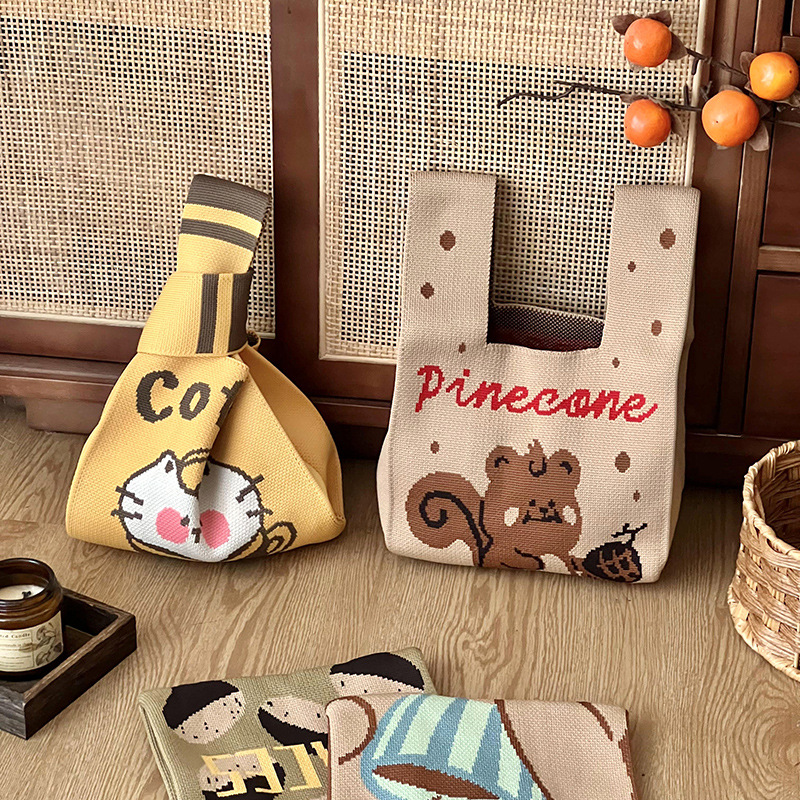 Bolsa de mano de damas nicho diseño de dibujos animados de punto chaleco de punto regalo de mano mochila de hombro al por mayor