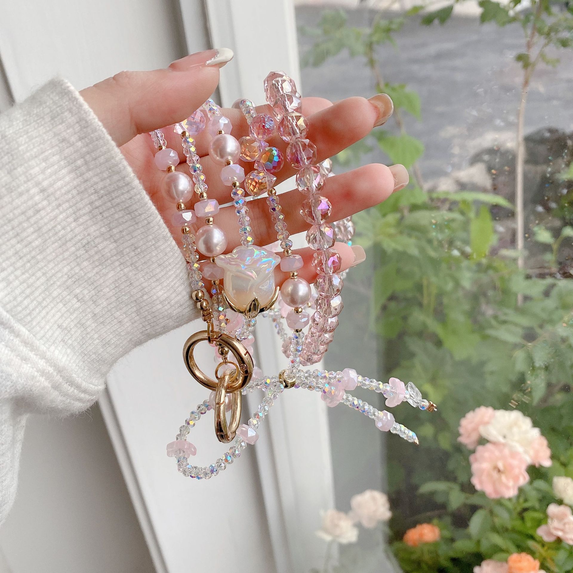 Boutique hecho a mano de alta gama teléfono móvil cadena colgante mujer tulipán rosa cadena larga cordón de teléfono móvil de moda colgante de mensajero largo