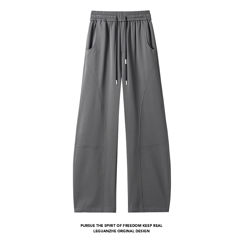 Schwarze Herren-Jogginghose mit diagonalem Schnitt und weitem Bein im sportlichen Herbst-Stil – Design im amerikanischen Retro-Stil_voghion.com