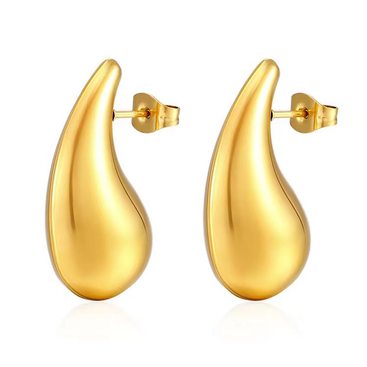 Aretes huecos de acero inoxidable de moda transfronteriza lujoso ligero temperamento femenino simple aretes de acero de titanio simple personalidad auriculares