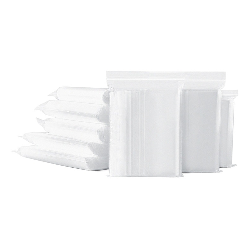 En stock al por mayor de sellado de plástico bolsa de plástico máscara de alimentos sellado de almacenamiento compacto bolsa de embalaje transparente PE ziplock bolsa