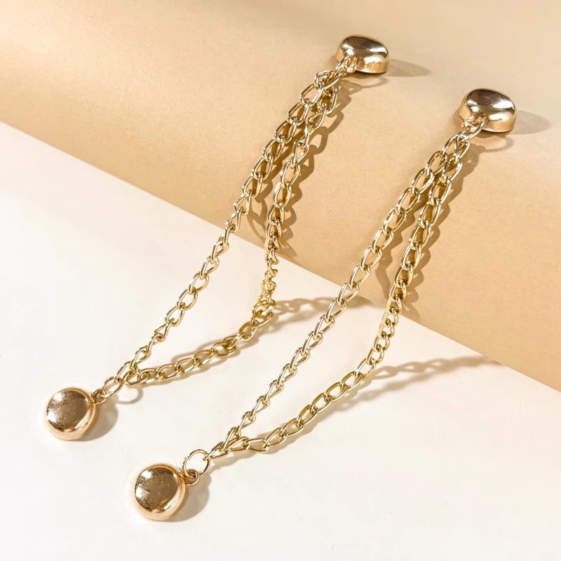 Esquina de la camiseta, peldaño apretado, artefacto corto, botones de nudos, mangas fijas, pantalones fijos, pies, cadena anti-flip, botones de succión magnéticos