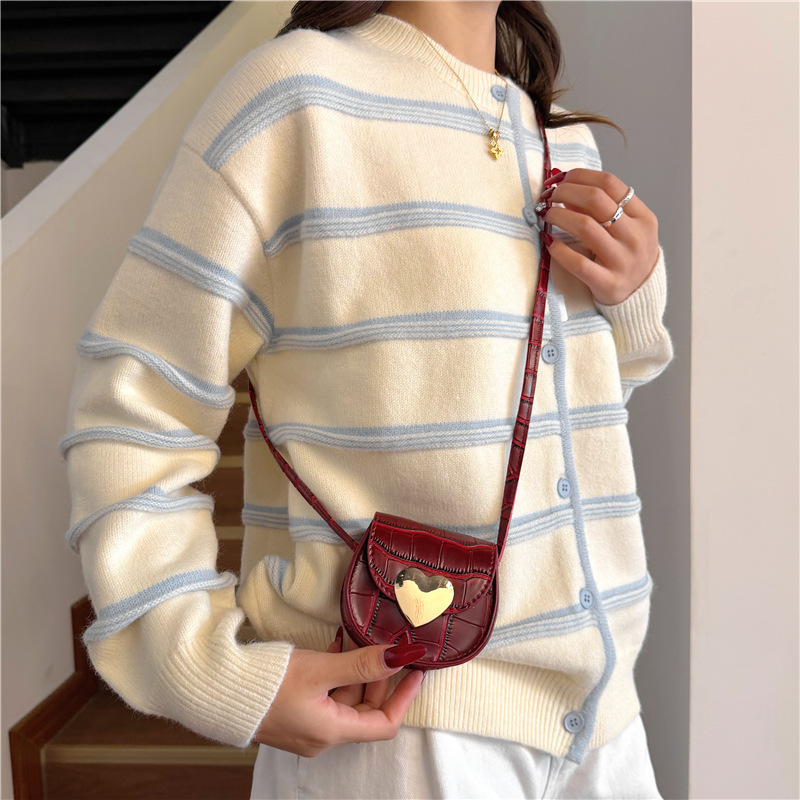 Coreano estilo extranjero piedra patrón bolso de hombro para hombres y mujeres, mini amor para padres e hijos mochila, bolso de moda para niños.