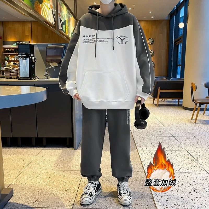 Otoño y invierno de hombre suelto encapuchado juego deportivo casual juvenil hombre con camiseta gruesa de dos piezas