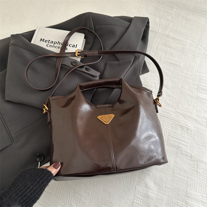 2024 alto valor retrógrado estilo de negocios Meillard bolso de cubo de mano de viaje versátil de invierno nuevo bolso de hombro