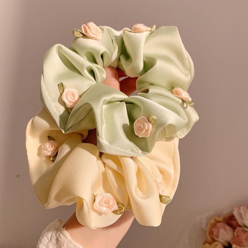 Flor dulce francesa collar de cabello de intestino femenino alta sensación coreana satén rosa cuerda de cabello cuerda de caballo baja tocado