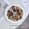 Small brown towel ring opp bag (about 100 2cm pieces in one bag)