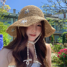 珍珠吊坠钩花草编渔夫帽女夏季2025新款出游防晒遮阳海边度假草帽