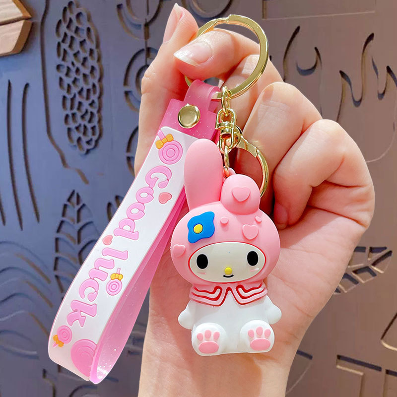 Cartoon Sanrio llavero Kulomi Yugui perro de goma suave muñeca niña corazón colgante colgante pequeño regalo al por mayor