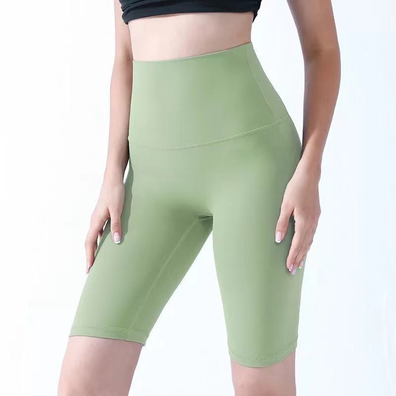 Pantalones cortos desnudos de mujer elásticos apretados para elevar las caderas de cinco puntos pantalones deportivos de secado rápido succión de sudor entrenamiento para correr fábrica de comercio de ping