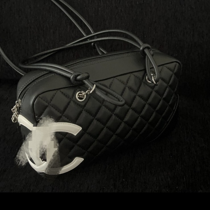 Xiaoxiang Kangpeng Black and White Genuine Leather Bowling Pillow Bag New Vintage Panda Color Underarm Shoulder Bag Fashionable Versatile Xiaoxiang Kangpeng Black and White Genuine Leather Bowling Pillow Bag New Vintage Panda Color Underarm Shoulder Bag Fashionable Versatile