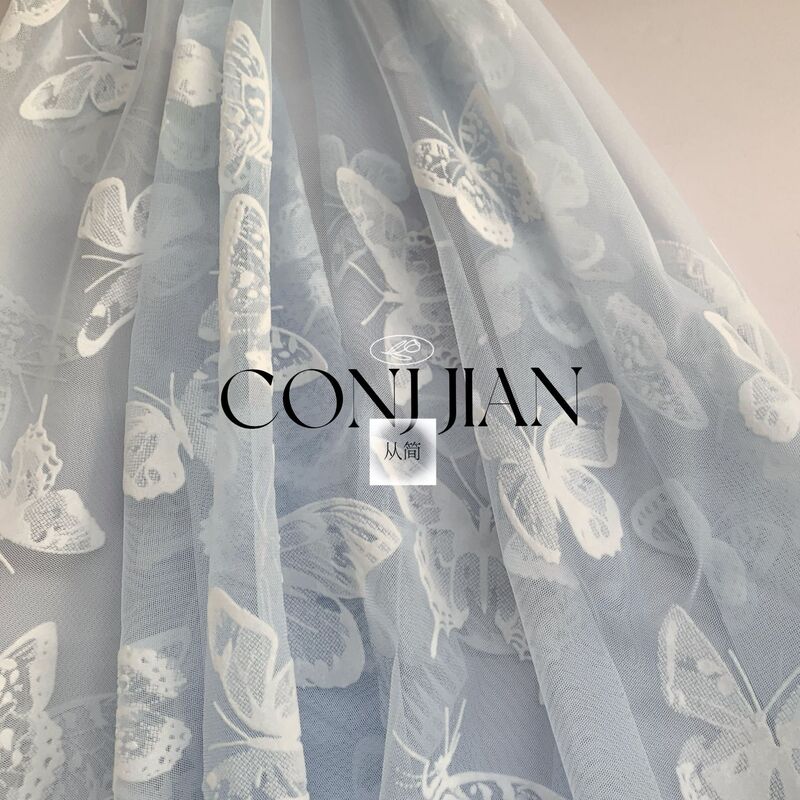 Wholesale Multi-Color Mesh Fabric Flocked Butterfly Fabric Lolita Children's Clothing Hanfu Large Sleeve Clothing Veil Mesh Fabric