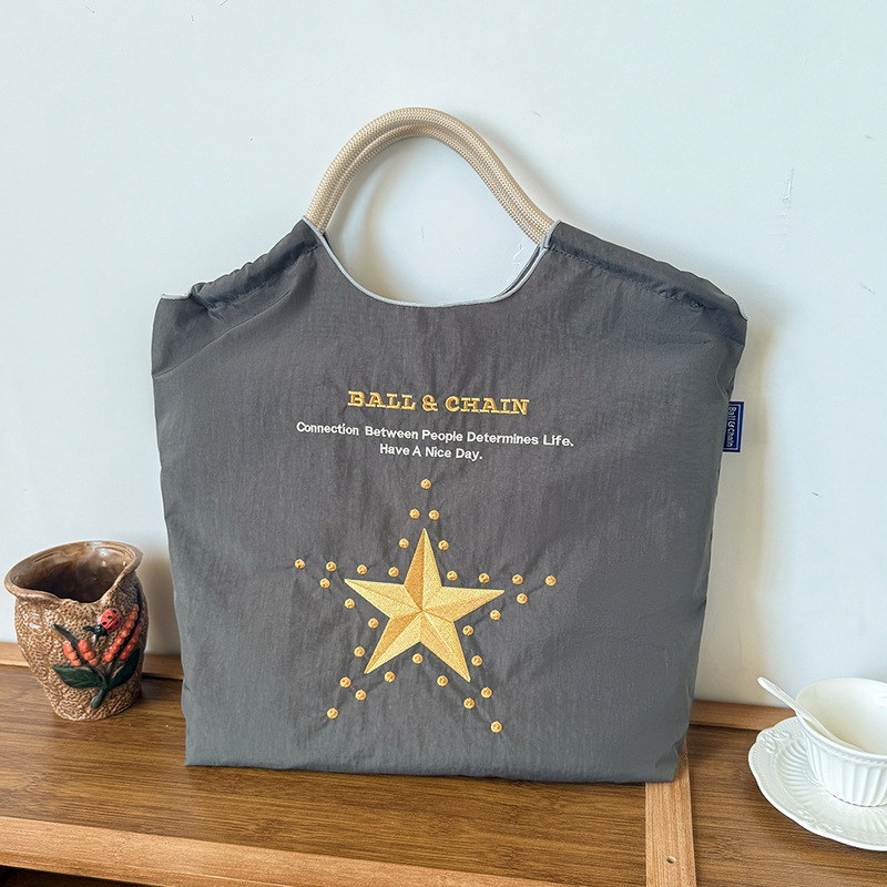 新しい日系ボールチェーン刺繍百合レジ袋小衆万針刺繍ナイロンハンドバッグ環境保護袋|undefined